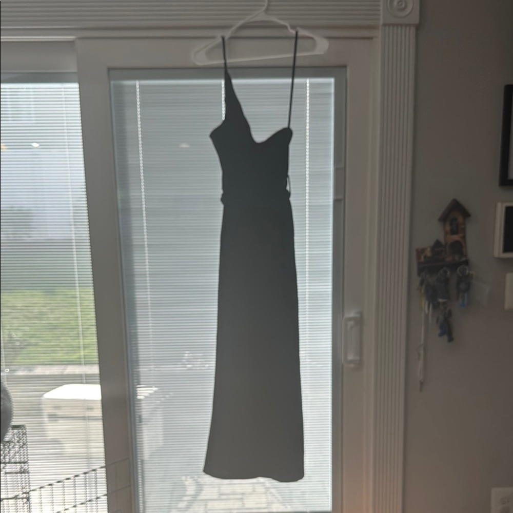 Elegant Black Women's jumpsuit with waist tie and pockets